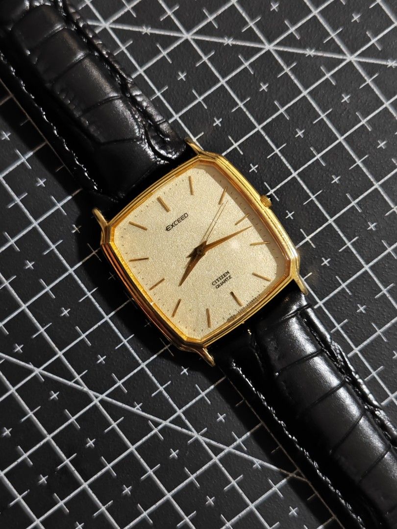 Citizen Exceed Quartz Gold Tone Square Watch (Category: Luxury Watches) located in Makati City. Submitted by reyf86 (Listing ID 1458488260, Image 1). Description: - Classic Citizen Exceed watch - Gold-tone square case - Textured dial - Black leather strap with crocodile texture - Quartz movement - Simple and elegant design - Versatile for everyday or formal wear Dm if interested .