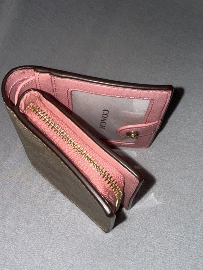 Coach Snap Wallet in canvas (Category: Wallets & Card holders) located in Manila. Submitted by panadeara (Listing ID 1458413125, Image 2). Description: coach snap wallet in signature canvass MEASUREMENTS Length: 4.25" Height: 3.5" Width: 1.0" FEATURES Outside zip coin pocket Three credit card slots Snap closure Full-length bill compartment ID window rfs : decluttering.