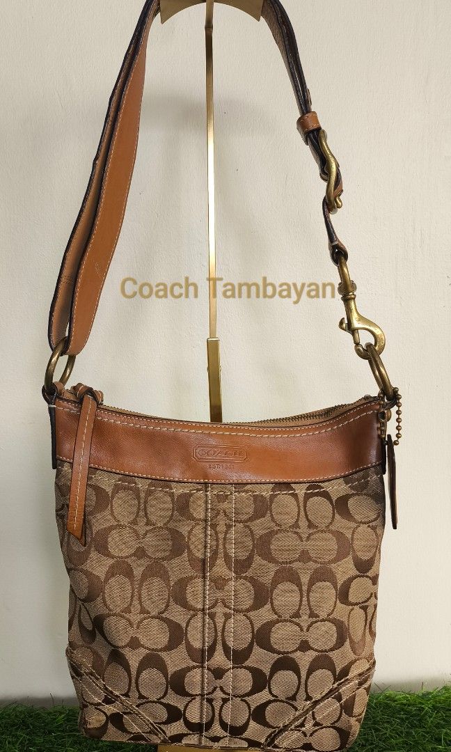 Coach Two way brown bag (Category: Luxury Bags & Wallets) located in Cebu City. Submitted by summerfae (Listing ID 1458368611, Image 1). Description: Good condition Has minimal rubs leather still intact.