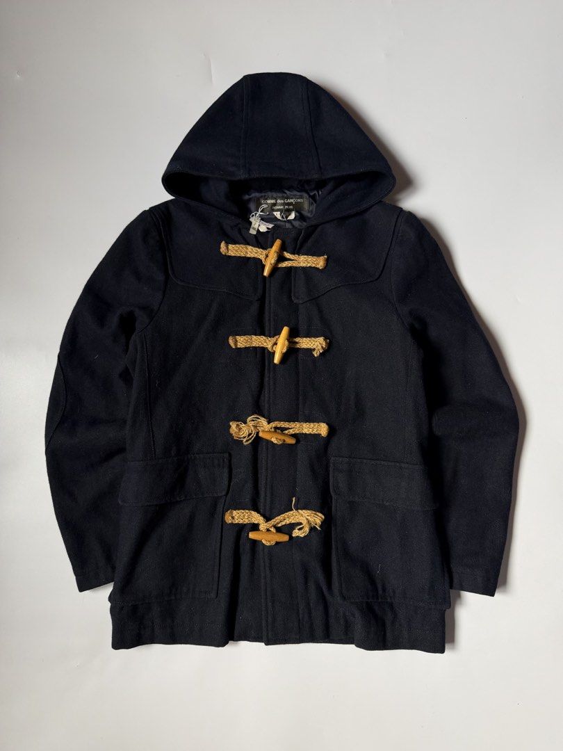 Comme des Garçons Homme Plus Wool Duffle Coat (Category: Coats, Jackets and Outerwear) located in Baguio. Submitted by themgarbage (Listing ID 1458358356, Image 1). Description: Size tagged:M Issue: Width:19.6 Length:26.5 Shoulder:17 Sleeve:24.2.