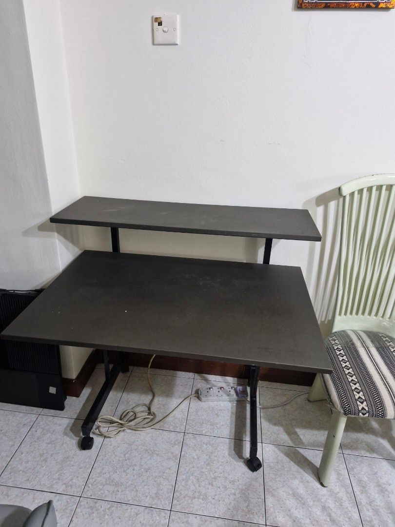 Computer table (Category: Tables & Sets) located in Singapore. Submitted by enochjekeh (Listing ID 1458449752, Image 1). Description: computer table. 91cm by 61cm for lower table. upper table is 91 cm by 31cm. height for lower side reaches 67cm self collection at sunrise ave would appreciate a tube of nespresso coffee capsule..