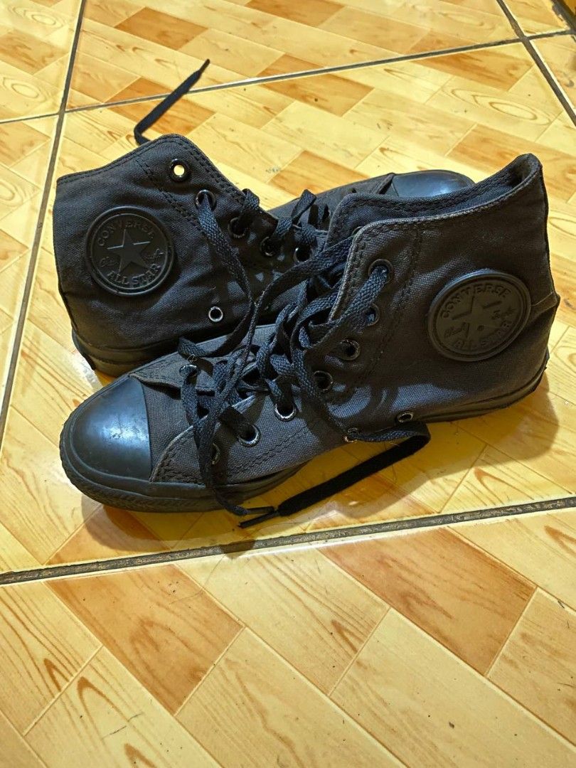 Converse All Star High Top Sneakers (Category: Sneakers) located in Manila. Submitted by jhazenmae (Listing ID 1458325054, Image 2). Description: - Classic black Converse high tops - Durable canvas material with rubber toe cap - Secure lace-up closure - Iconic Chuck Taylor ankle patch - Versatile for everyday wear.