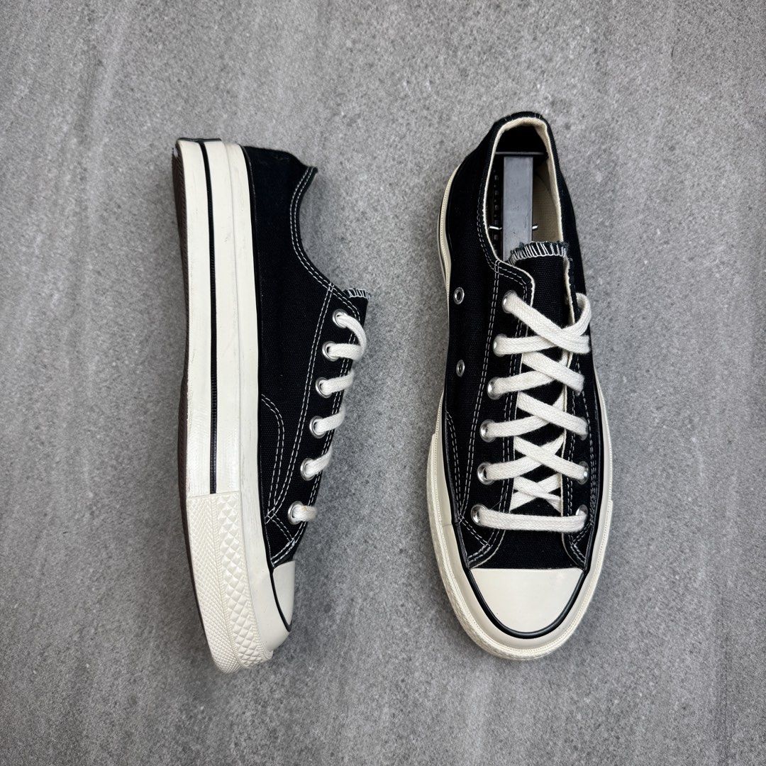 Converse Chuck 70 Low Top Black (Category: Sneakers) located in Manolo Fortich. Submitted by thrift_by_biji (Listing ID 1458445115, Image 2). Description: - Classic black Converse Chuck 70 low tops - White laces and stitching - Iconic rubber toe cap and sole - Great for everyday wear - Versatile style that goes with everything.