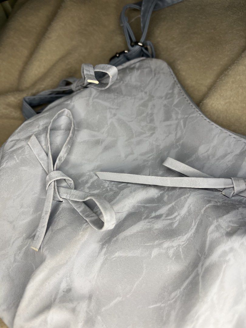 Coquette Blue Fairy Sling/Backpack Bag (Category: Shoulder Bags) located in Tanauan. Submitted by leighshin (Listing ID 1458432489, Image 2). Description: Brand new Ribbon design Can use as shoulder bag and as backpack .