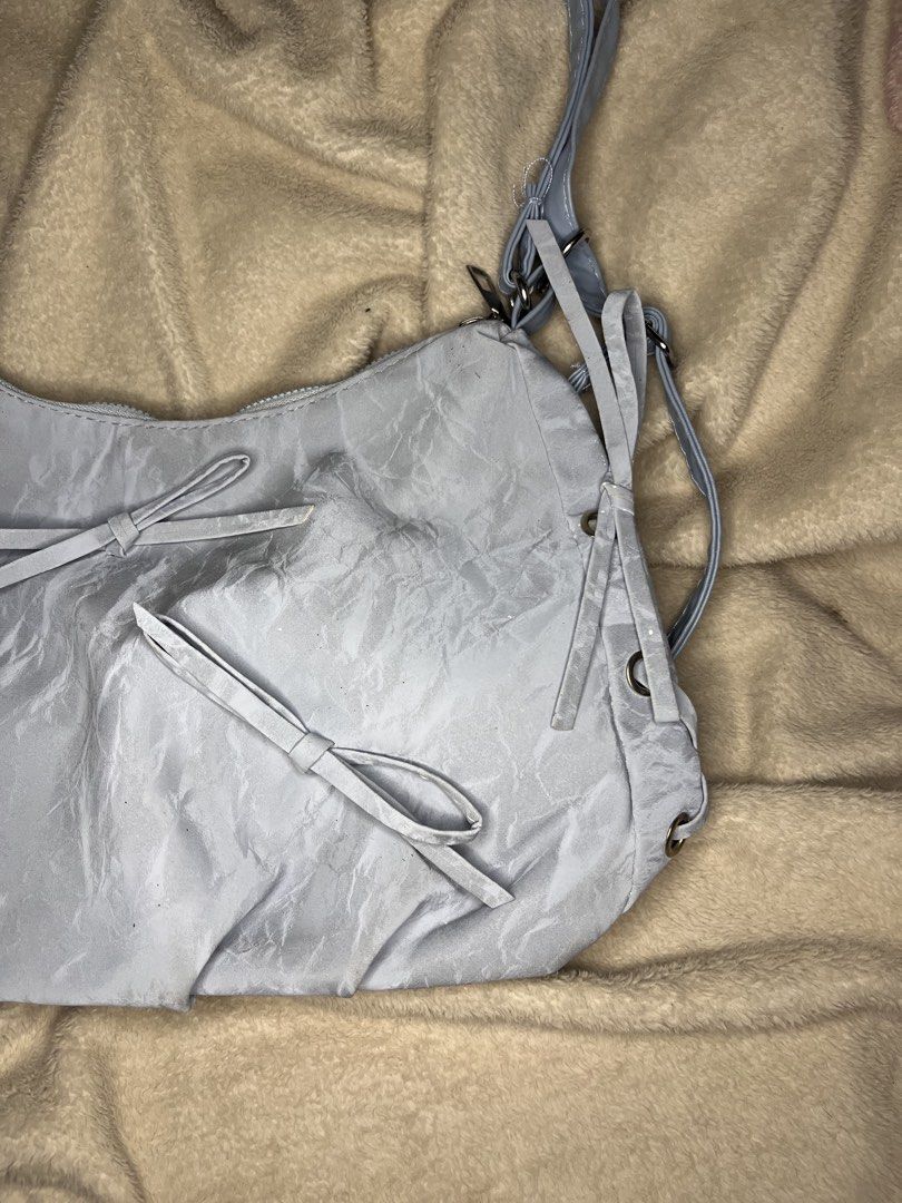 Coquette Blue Fairy Sling/Backpack Bag (Category: Shoulder Bags) located in Tanauan. Submitted by leighshin (Listing ID 1458432489, Image 3). Description: Brand new Ribbon design Can use as shoulder bag and as backpack .