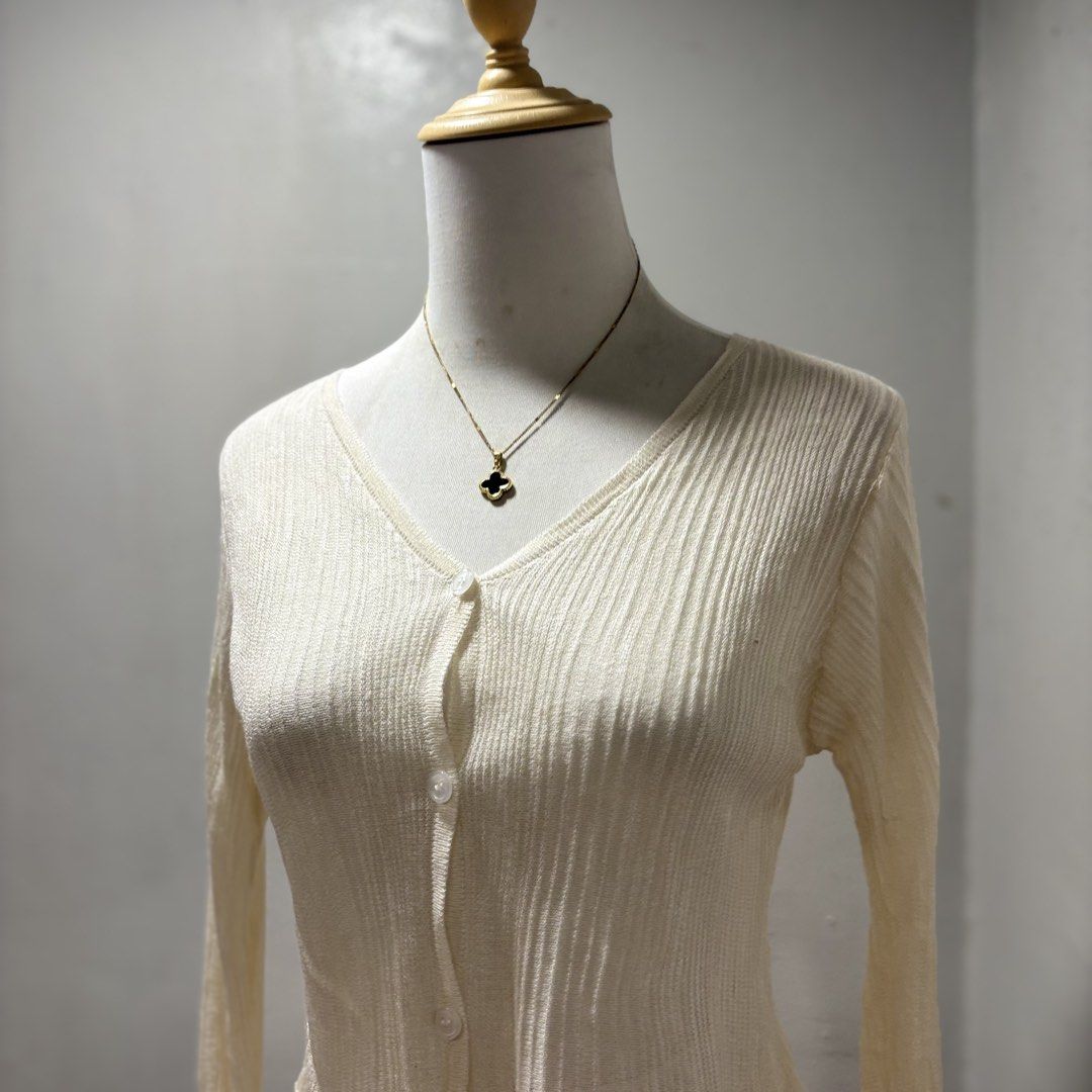 Cream Ribbed Knit Button-Up Cardigan (Category: Coats, Jackets and Outerwear) located in Mandaluyong City. Submitted by shopwithjuu (Listing ID 1458332174, Image 2). Description: Cream ribbed knit cardigan. Button-up, long sleeves. Lightweight and perfect for layering. For more items IG : shop.radcouture.