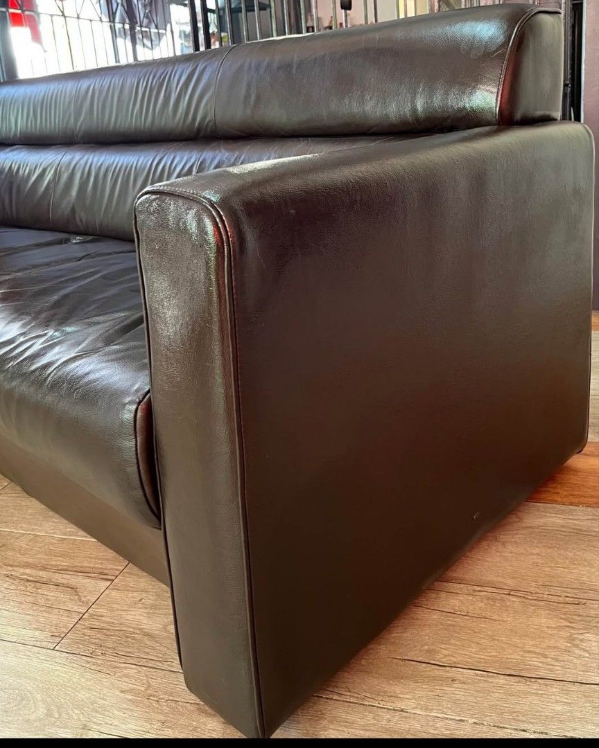 Dark Brown Leather 3-Seater Sofa (Category: Sofas) located in Manila. Submitted by otansebastian01 (Listing ID 1458412129, Image 2). Description: - Dark brown 3-seater leather sofa -180cm x 80cm - Comfortable cushions - Beautiful sheen on the leather - Modern and sleek design - Fits well in most living spaces - Ideal for lounging and entertaining - Ready for a new home check item near las pinas cityhall.