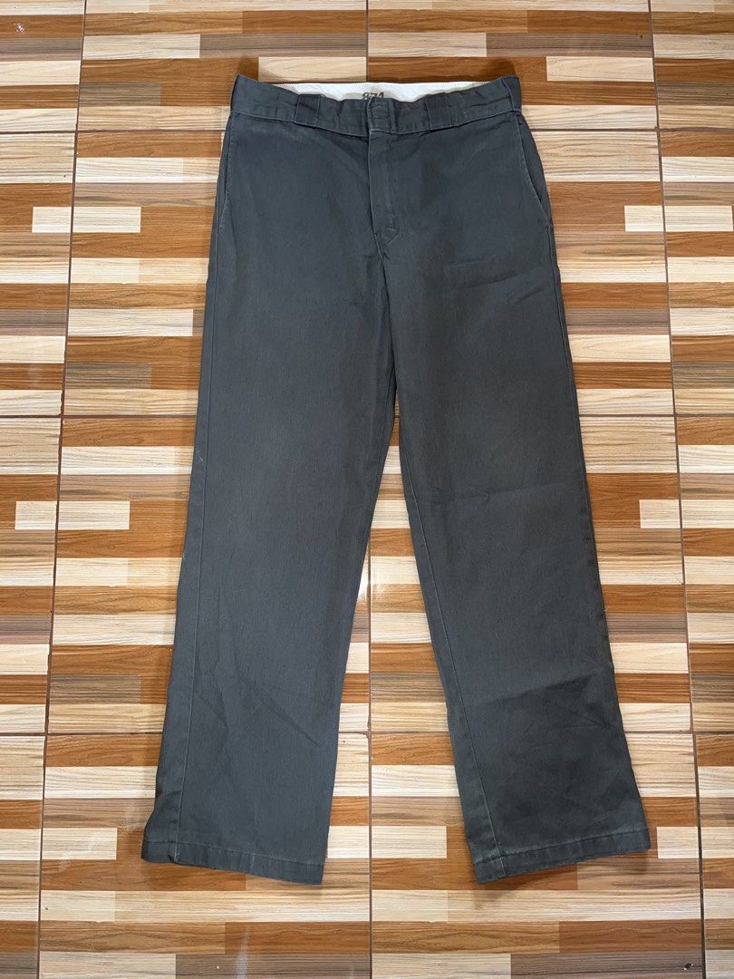 Dickies 874 Original Fit Work Pants Grey (Category: Trousers) located in Nabua. Submitted by lastthrift2.0 (Listing ID 1458396725, Image 2). Description: Dimes•32x40 Issue•distressed hem - Dickies 874 Original Fit work pants - Classic grey color - Durable and comfortable - Perfect for work or casual wear - Straight leg fit - Ready for a new owner.