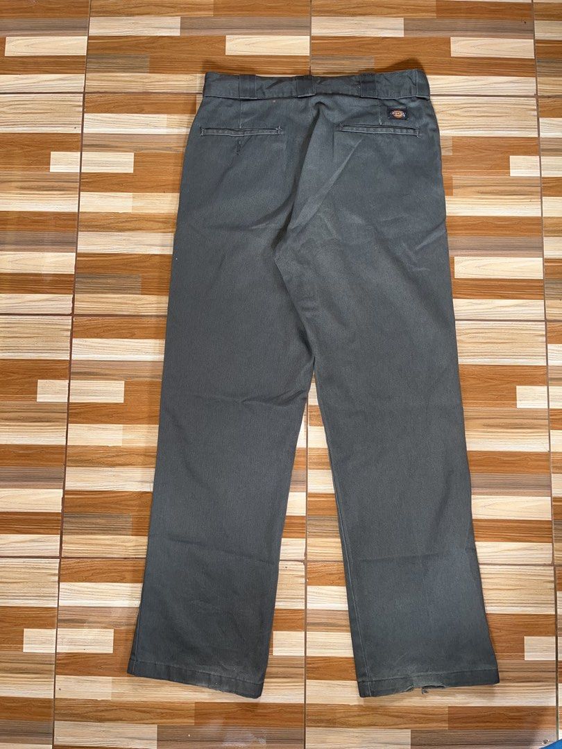 Dickies 874 Original Fit Work Pants Grey (Category: Trousers) located in Nabua. Submitted by lastthrift2.0 (Listing ID 1458396725, Image 3). Description: Dimes•32x40 Issue•distressed hem - Dickies 874 Original Fit work pants - Classic grey color - Durable and comfortable - Perfect for work or casual wear - Straight leg fit - Ready for a new owner.