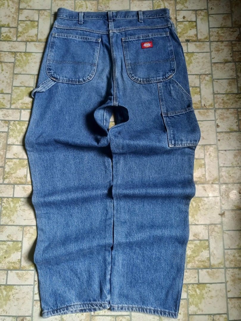 Dickies Carpenter Jeans 34x32 Blue Denim (Category: Jeans) located in Santo Tomas. Submitted by ven_thrift (Listing ID 1458300701, Image 1). Description: - Classic Dickies Carpenter Jeans - Size: 34 Waist x 32 Inseam - Color: Blue Denim - Material: 100% Cotton - Features: Iconic red Dickies logo patch, multiple functional pockets - Origin: Made in Mexico - Style: Durable and versatile for work or casual wear.