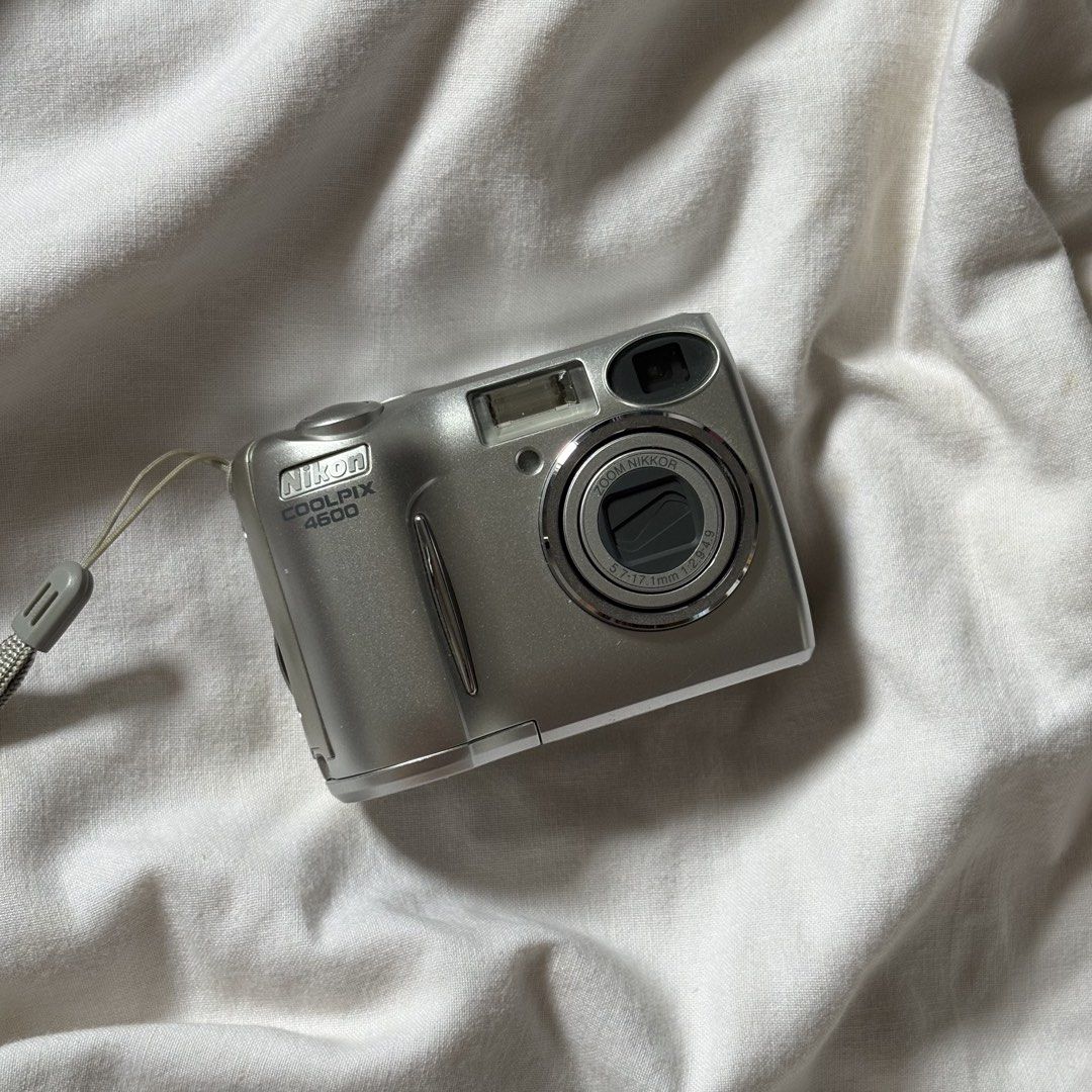 DIGICAM NIKON COOLPIX 4600 DIGITAL CAMERA (Category: Cameras) located in Manila. Submitted by la.memoriaph (Listing ID 1458497458, Image 1). Description: Body: 9.5/10 4MP | Released in February 2005 Uses SD Card & 2 pcs Double A Battery TESTED: All posted photos are RAW FULLY FUNCTIONAL NO ISSUE WHAT’S ON THE BOX: • Unit • Memory Card • Card Reader • Pouch • Beaded Wrist Strap • Stickers Accepting RESERVATIONS/ LAYAWAY TERMS as long as can settle