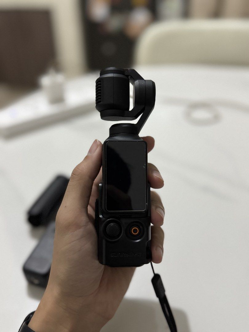 DJI Osmo Pocket 3 Creator Combo with Accessories (Category: Cameras) located in Cavite. Submitted by jayjaybarlaan (Listing ID 1458332100, Image 3). Description: - DJI Osmo Pocket 3 Creator Combo - Includes: Camera, Mic Transmitter, Mic Windscreen, Battery Handle, Mini Tripod, Carrying Bag - Bonus: 2x SanDisk 32GB Extreme SD Cards & DJI Memory Card Case - Ideal for vlogging and content creation.