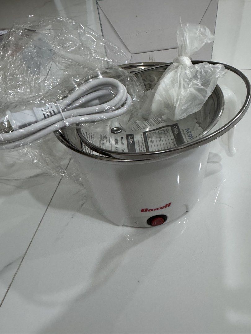 Dowell Multicooker EKC-18 Stainless Inner Body 1.2L (Category: Cookers) located in Las Pinas. Submitted by vanethneth (Listing ID 1458443141, Image 3). Description: - Dowell EKC-18 Multicooker - Stainless steel inner body - 1.2L capacity - Light indicator - Boil dry protection - Single switch operation - Auto shut-off at boiling - Thermal fuse protected - Detachable power cord - Glass lid included - 500 Watts.