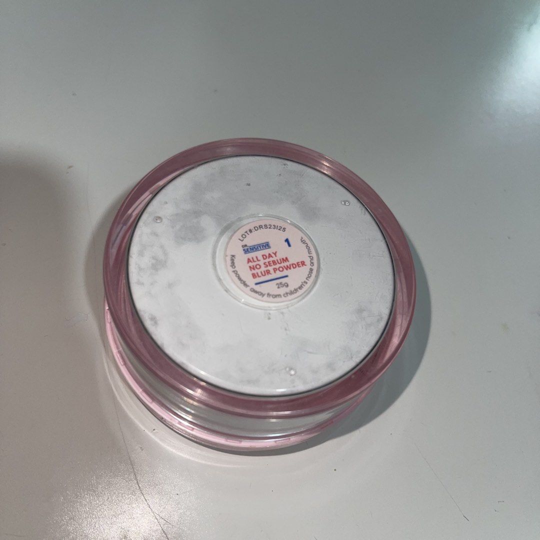 Dr. Sensitive All Day No Sebum Blur Powder Translucent makeup (Category: Makeup) located in Manila. Submitted by prelovedcloset.mnl (Listing ID 1458423982, Image 2). Description: - Dr. Sensitive All Day No Sebum Blur Powder - Shade: Translucent - Effect: Soft focus, blurs imperfections - Benefit: Controls oil (no sebum) - Packaging: Comes in a pink jar - Use: Great for setting makeup.