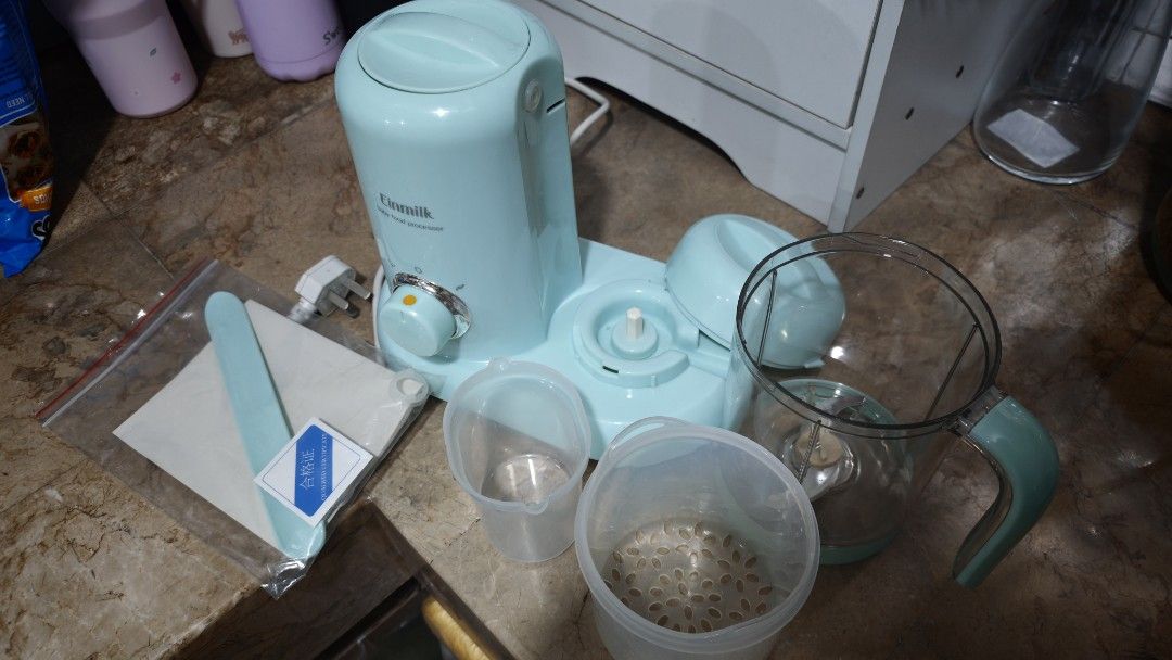 Einmilk Baby Food Processor Steamer and Blender (Category: Weaning & Toddler Feeding) located in Quezon City. Submitted by smai_k (Listing ID 1458445821, Image 2). Description: - Einmilk Baby Food Processor - Steams and blends food for your baby - Comes with measuring cups and spatula - Features an easy-to-use dial for settings - Perfect for making homemade baby food - Unit is clean and ready for its new home Like new Barely used No stains.