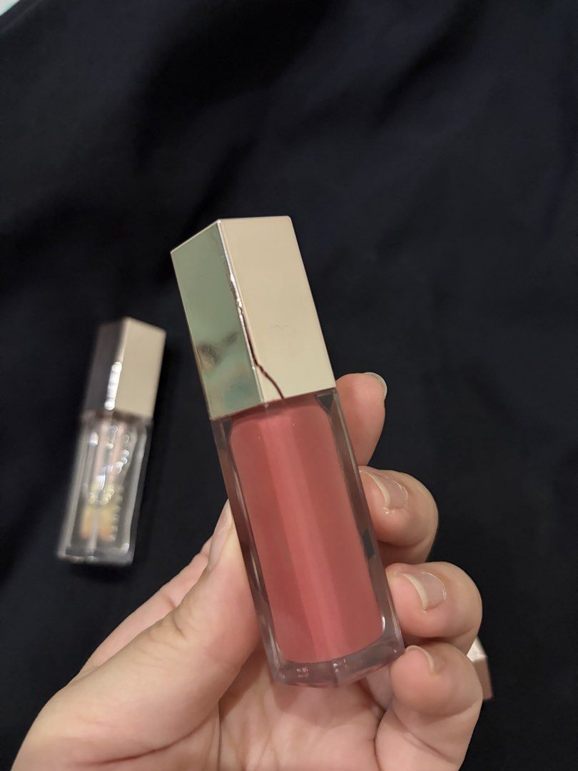 Fenty Beauty Glosses (Category: Makeup) located in Quezon City. Submitted by christyl1997 (Listing ID 1458379591, Image 3). Description: - 300php EACH - get all for 800 - the lid of Cream gloss has crack :( - shades: Gloss Bomb in Pink Dragonfly, Gloss Bomb Cream in Fenty Glow, Gloss Bomb in Glass Slipper - no box.