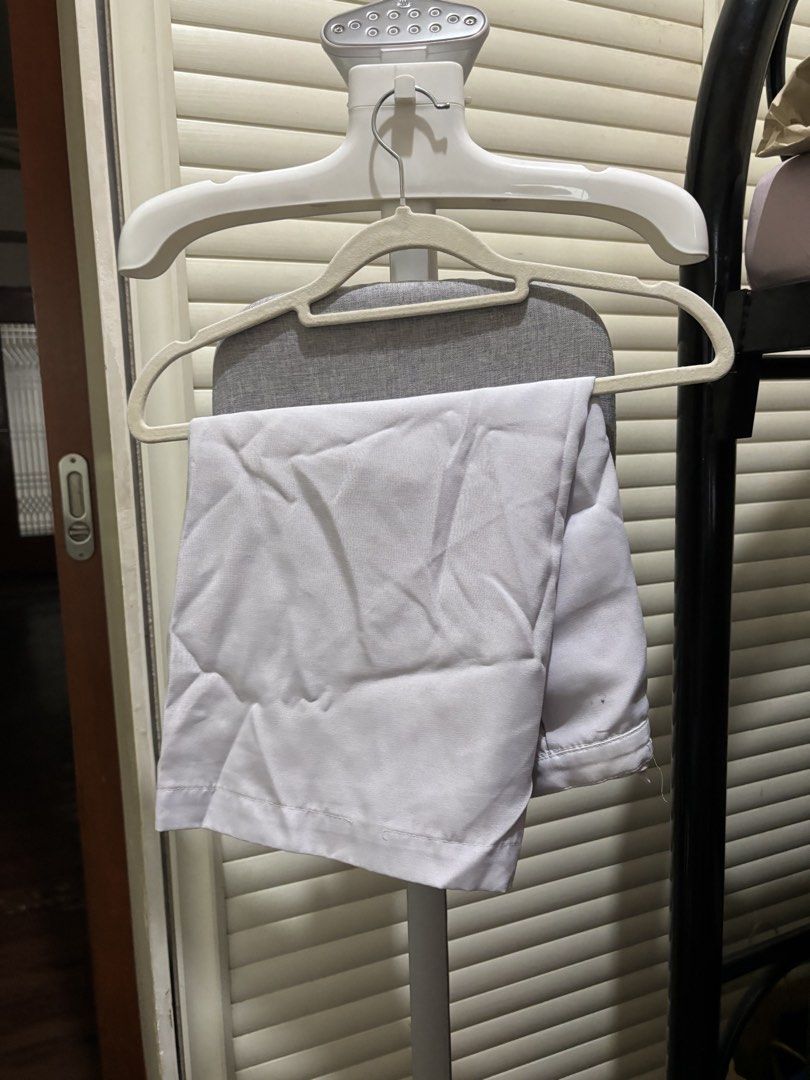 FEU Nursing uniform set (Category: Sets or Coordinates) located in Manila. Submitted by toastedsiopao.o (Listing ID 1458491888, Image 2). Description: - White short-sleeved blouse with collar and button details. - Flattering peplum hem on the blouse. - Comes with matching white pants. - Ideal for school uniform or everyday wear..