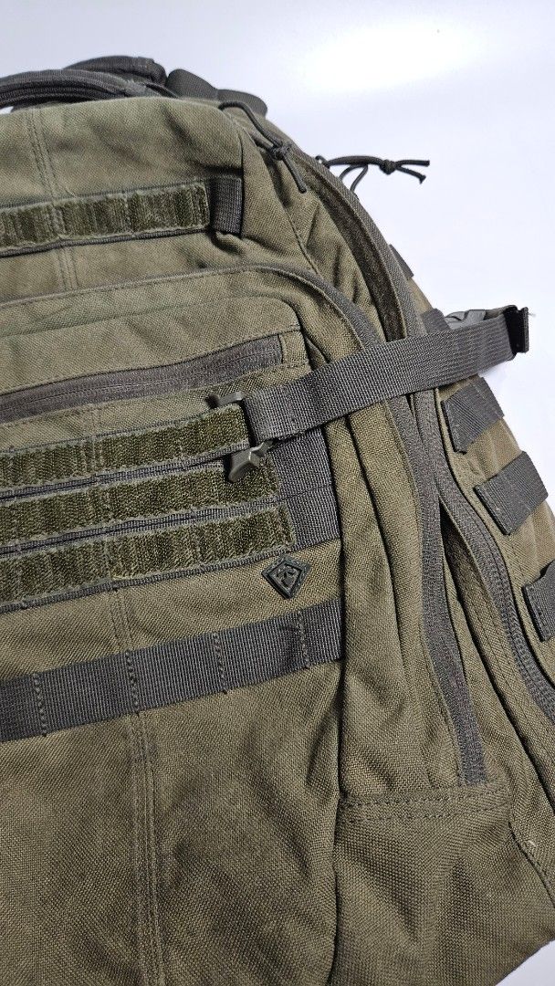 First Tactical Specialist backpack (Category: Backpacks) located in Alfonso. Submitted by jbcamet (Listing ID 1458452198, Image 2). Description: - Brand: First Tactical - Color: Green - Features: Multiple compartments, MOLLE webbing for customization - Comfort: Adjustable padded shoulder straps - Durability: Made with tough, durable material - Ideal for: Outdoor adventures, hiking, camping, or everyday carry.