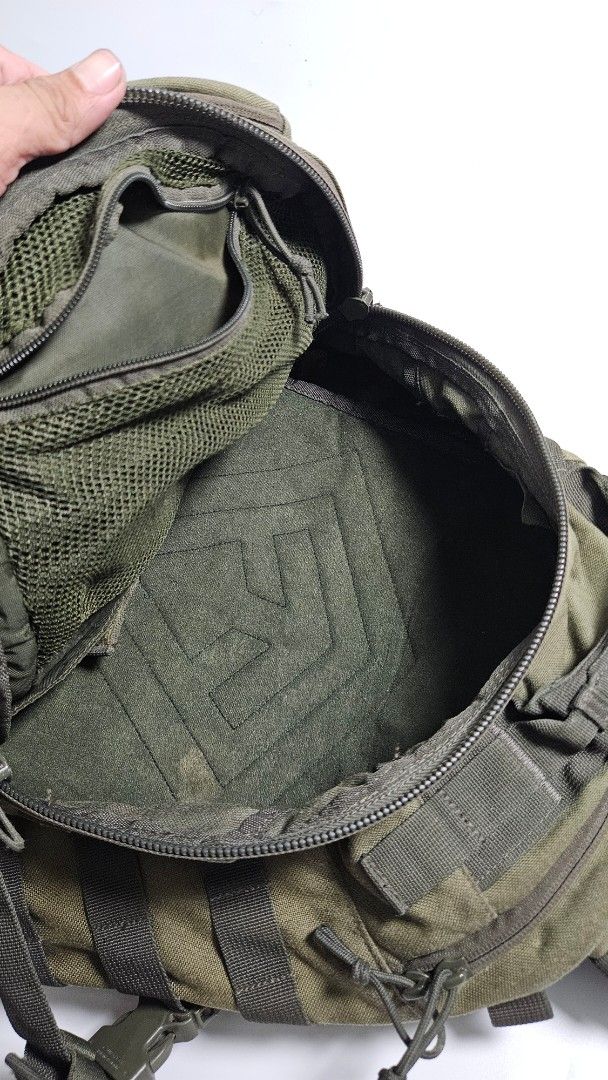 First Tactical Specialist backpack (Category: Backpacks) located in Alfonso. Submitted by jbcamet (Listing ID 1458452198, Image 3). Description: - Brand: First Tactical - Color: Green - Features: Multiple compartments, MOLLE webbing for customization - Comfort: Adjustable padded shoulder straps - Durability: Made with tough, durable material - Ideal for: Outdoor adventures, hiking, camping, or everyday carry.