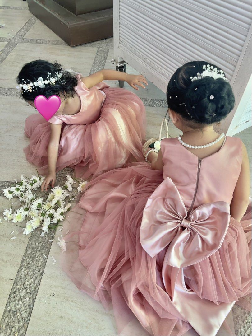 Flower Girl Gowns - 2 sets (Category: Babies & Kids Fashion) located in Quezon City. Submitted by cookies_closet_ (Listing ID 1458475573, Image 3). Description: Color: Oldrose 1 can fit to 18 months or 2 years old petite 1 can fit 4 years old With big bow at the back. With free 2 flower headbands Used once We can ship via lalamove or j&t.