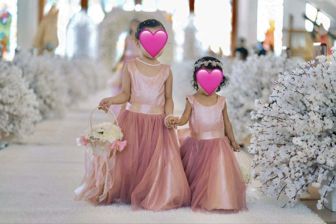 Flower Girl Gowns - 2 sets (Category: Babies & Kids Fashion) located in Quezon City. Submitted by cookies_closet_ (Listing ID 1458475573, Image 2). Description: Color: Oldrose 1 can fit to 18 months or 2 years old petite 1 can fit 4 years old With big bow at the back. With free 2 flower headbands Used once We can ship via lalamove or j&t.