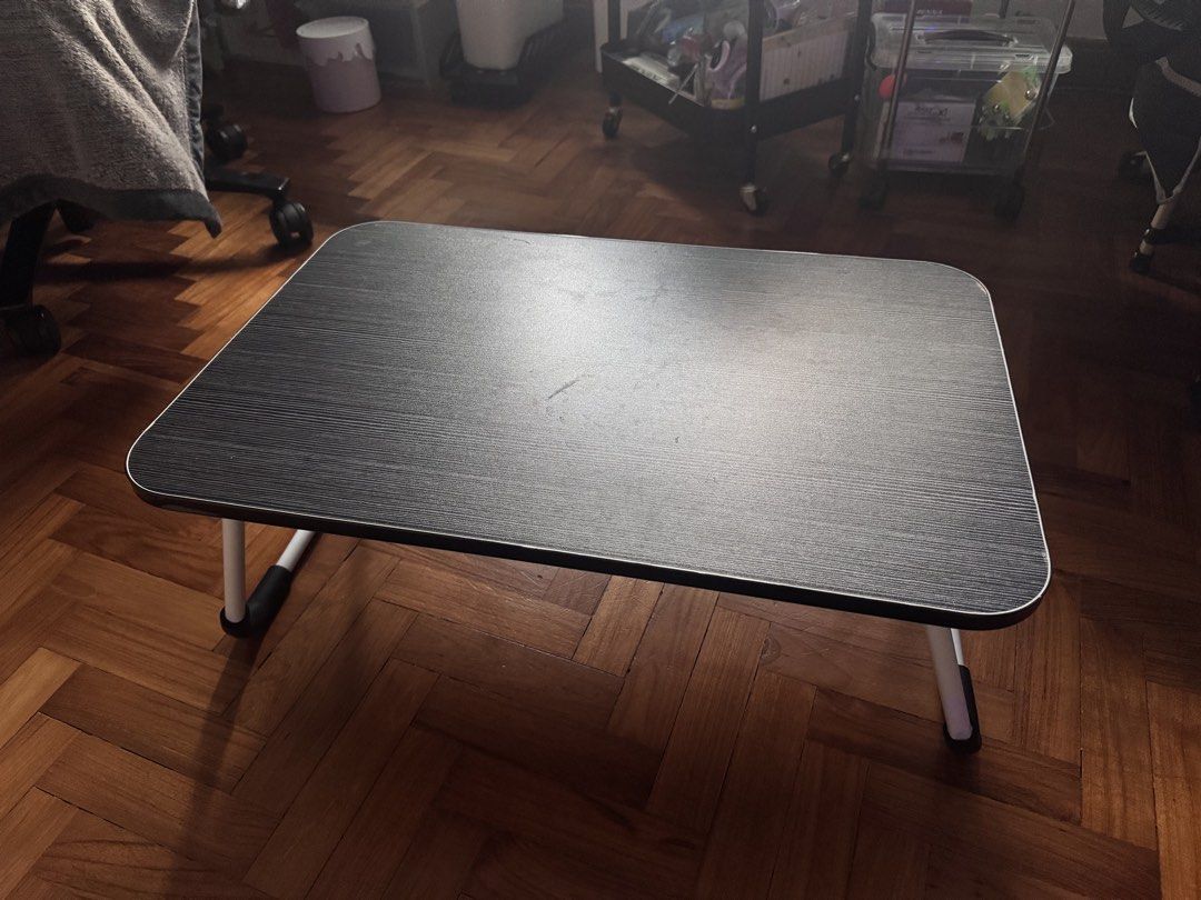 Foldable Table (Category: Tables & Sets) located in Singapore. Submitted by weenn. (Listing ID 1458404418, Image 1). Description: - Portable foldable table - Lightweight and easy to carry Size: 60cmL x 40cmW x 28cmH.