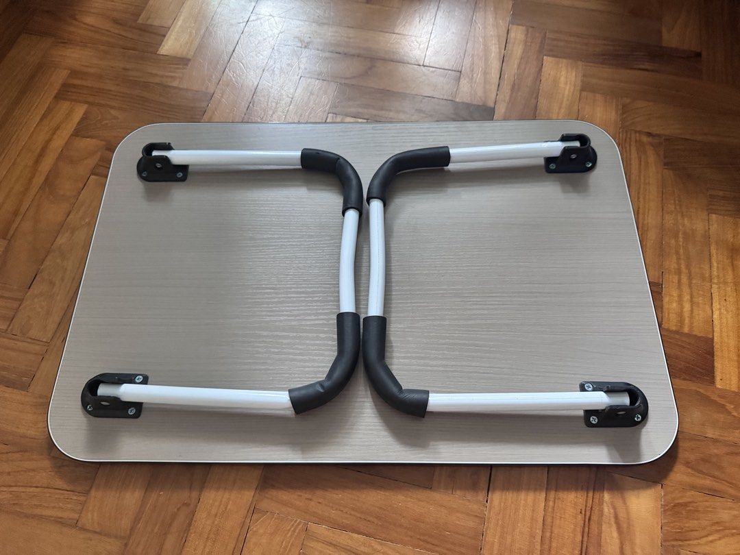 Foldable Table (Category: Tables & Sets) located in Singapore. Submitted by weenn. (Listing ID 1458404418, Image 2). Description: - Portable foldable table - Lightweight and easy to carry Size: 60cmL x 40cmW x 28cmH.