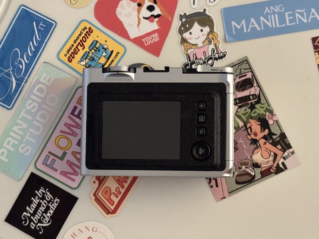 fujifilm instax mini evo (Category: Cameras) located in Angeles City. Submitted by samantha_moon (Listing ID 1458326537, Image 2). Description: instax mini evo for sale 🎞️ ⭐️inclusions: camera and charging chord only in pristine condition, dm for more photos and test shots * Sensor: 1/5-inch CMOS * Resolution: 2560 × 1920 px * Lens: 28mm equivalent, f/2.0 * Shutter speed: 1/4–1/8000 sec * ISO: 100–1600 (Auto) * Storage: Internal memory + microSD