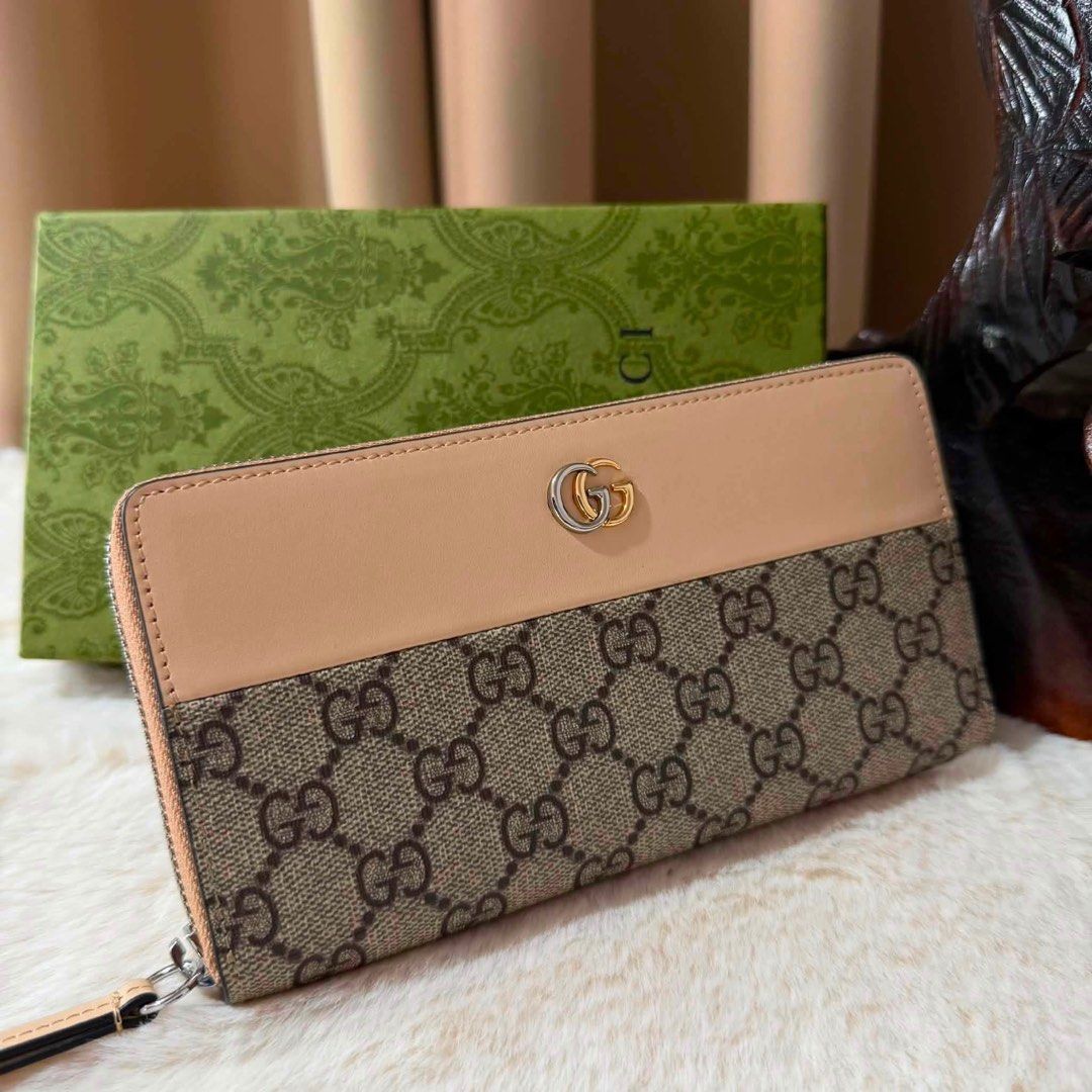 GG Monogram Zip Around Wallet Beige/Brown (Category: Luxury Bags & Wallets) located in Manila. Submitted by bagsandmanymanymore1 (Listing ID 1458315442, Image 2). Description: - Authentic Gucci zip around wallet - Classic GG monogram canvas with beige leather trim - Multiple interior card slots and compartments - Serial number visible inside - Comes with original box and dust bag - Made in Italy Please read before you order 👉🏻❗️Payment first be