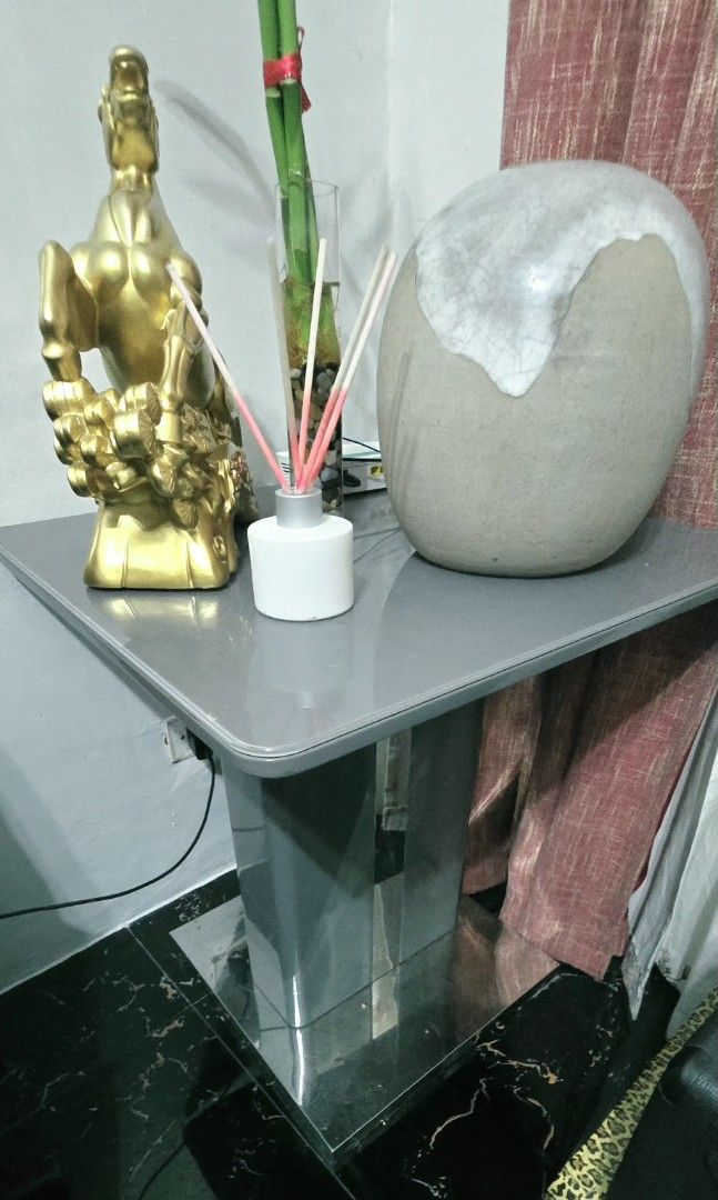 Gold Horse Figurine, Reed Diffuser, Lucky Bamboo, Stone Decor (Category: Other Home Decor) located in Manila. Submitted by ubasirene (Listing ID 1458409204, Image 1). Description: Center / Side table 40x40x60 tempared glass gray with combi chrome. Bought for 10K thus selling low for 5K only. Rfs redesign my living room. magpalit ako. Iam also selling the set of recliner leather sofa 2&1seater with minor/need repair due to wear and tear if masilil