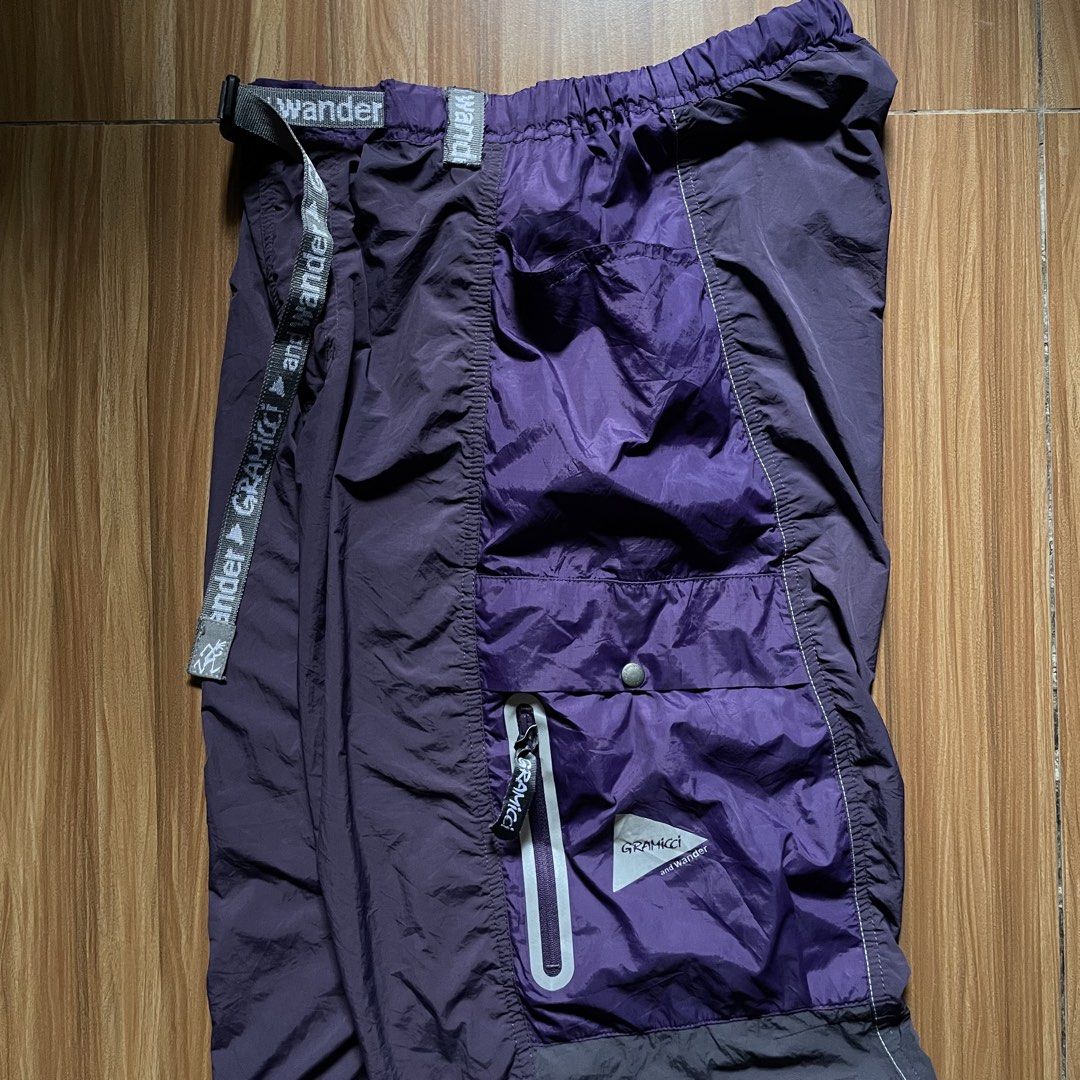 Gramicci x And Wander Patchwork Wind Pants (Category: Joggers) located in General Mariano Alvarez. Submitted by 4117_thriftnthrive (Listing ID 1458465986, Image 2). Description: In excellent condition No flaws Size on tag: Asia M / Usa S Measurements Waistline: 29 - 36 (stretchable) Length: 40” Thigh: 14” Hem: 9” (adjustable) ₱4,500 Plus Shipping Fee.