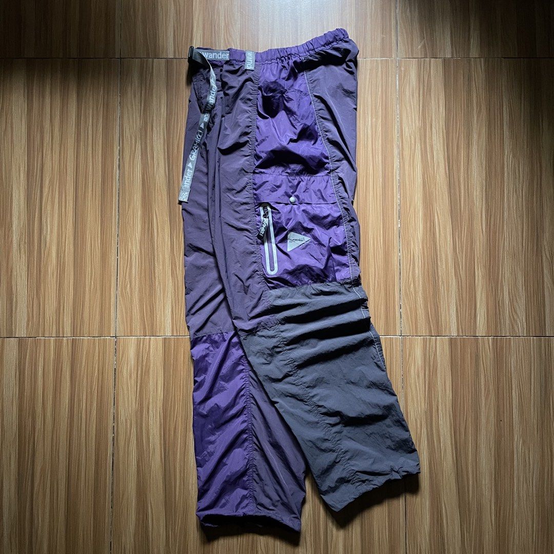 Gramicci x And Wander Patchwork Wind Pants (Category: Joggers) located in General Mariano Alvarez. Submitted by 4117_thriftnthrive (Listing ID 1458465986, Image 1). Description: In excellent condition No flaws Size on tag: Asia M / Usa S Measurements Waistline: 29 - 36 (stretchable) Length: 40” Thigh: 14” Hem: 9” (adjustable) ₱4,500 Plus Shipping Fee.