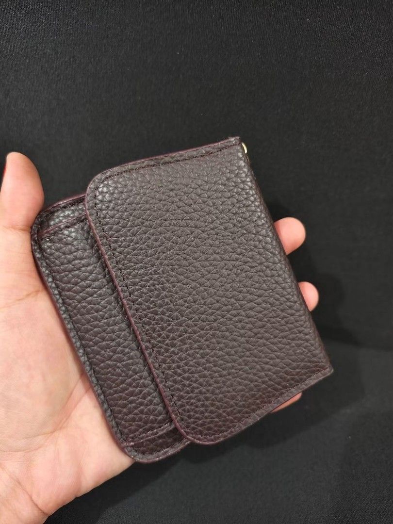 Green Leather Tri-Fold Wallet with Coin Pocket (Category: Wallets & Card holders) located in Santa Rosa. Submitted by gettinggorgeousph (Listing ID 1458433185, Image 2). Description: Cute green textured leather wallet with card slots and a snap coin pocket. Fits easily in pockets or small bags. Also available in brown..