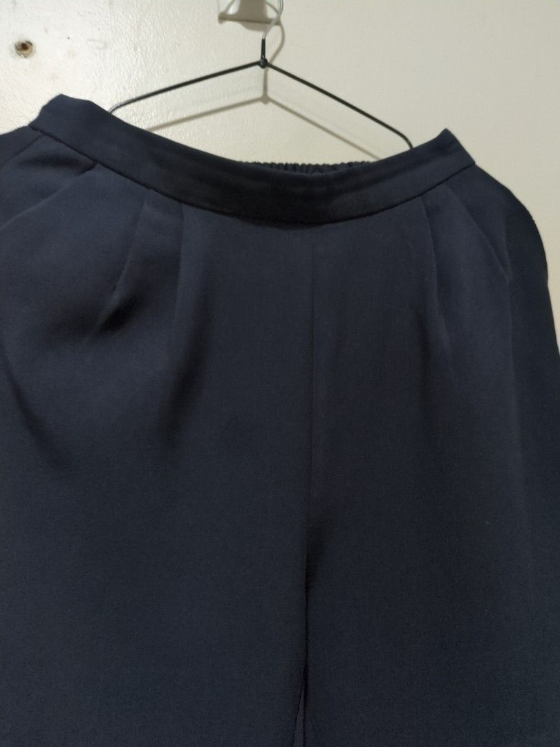 GU Trousers Navy (Category: Other Bottoms) located in Mandaluyong City. Submitted by bbcatham (Listing ID 1458434771, Image 2). Description: GU Navy Blue Office Trousers. No flaws. Side zipper closure. Size: Medium on tag Waist: 26-28in (garterized back) Hips: up to 40in Length: 36in Leg hole: 12in Condition: 9/10.