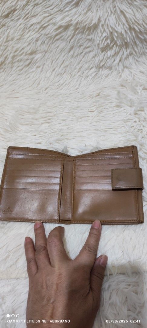 🇯🇵Gucci Marmont bifold wallet (Category: Luxury Bags & Wallets) located in Makati City. Submitted by yerbua103 (Listing ID 1458478889, Image 3). Description: A beautiful compact vintage wallet from Gucci in camel/dark beige leather bifold wallet featuring the iconic interlocking gold-tone logo. It is chic, minimalist and functional. Manage your expectations as you're buying a preloved/ukay wallet. I don't authenticate as I'm not an expert nor a
