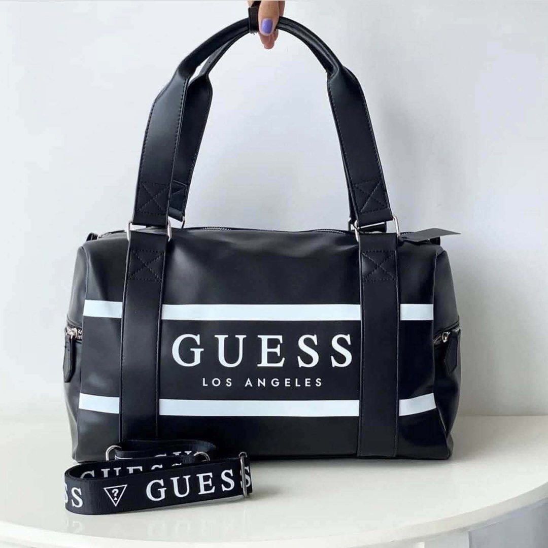 Guess Gym/ Travel Bag (Category: Shoulder Bags) located in Quezon City. Submitted by stuffs.hellyy (Listing ID 1458481032, Image 1). Description: Size:18 inches With dust bag&serial number .