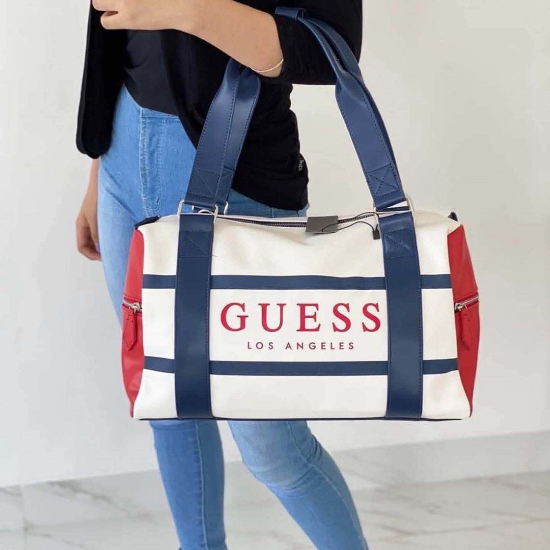 Guess Gym/ Travel Bag (Category: Shoulder Bags) located in Quezon City. Submitted by stuffs.hellyy (Listing ID 1458481032, Image 3). Description: Size:18 inches With dust bag&serial number .