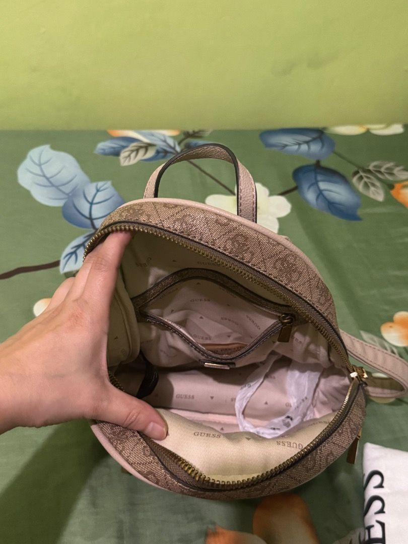Guess small backpack (Category: Backpacks) located in Las Pinas. Submitted by declutter.with.love (Listing ID 1458406921, Image 2). Description: Brand new without tag Authentic Comes with dustbag.