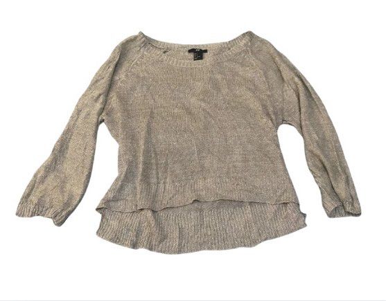 H&M Dusty Blue Shiny Sparkly Blouse (Category: Blouses) located in Manila. Submitted by declutter.k (Listing ID 1458452305, Image 1). Description: - s on tag, can fit m to semi l - width: 16.5 in - length: 20 in - sleeve length: 19 in.