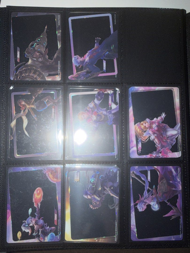 Holo Trading Cards - Anime/Game Characters (Category: Raw Singles) located in Manila. Submitted by ellede32655 (Listing ID 1458379128, Image 1). Description: - Collection of holographic trading cards - Features popular anime/game characters - Unique, shiny, iridescent designs - Includes cards named 'Lainia', 'Granver', 'Fairy', 'Sivanna' - Ideal for collectors -.