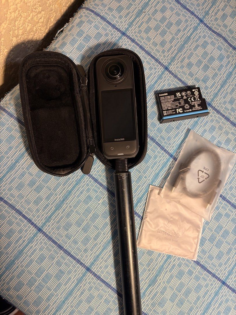 Insta360 X5 360 camera with extra battery and selfie stick (Category: Video Cameras) located in Marikina City. Submitted by mrslogronies (Listing ID 1458368596, Image 1). Description: FOR SALE: Insta360 X5 ₱27,000 Used but in great working condition. Reason for selling: upgraded to the Insta360 X6. Includes: • Insta360 X5 • 2 original X5 batteries • Invisible selfie stick • Hard case • Cord • Cleaner Extra original X5 Ultra Battery was purchased 