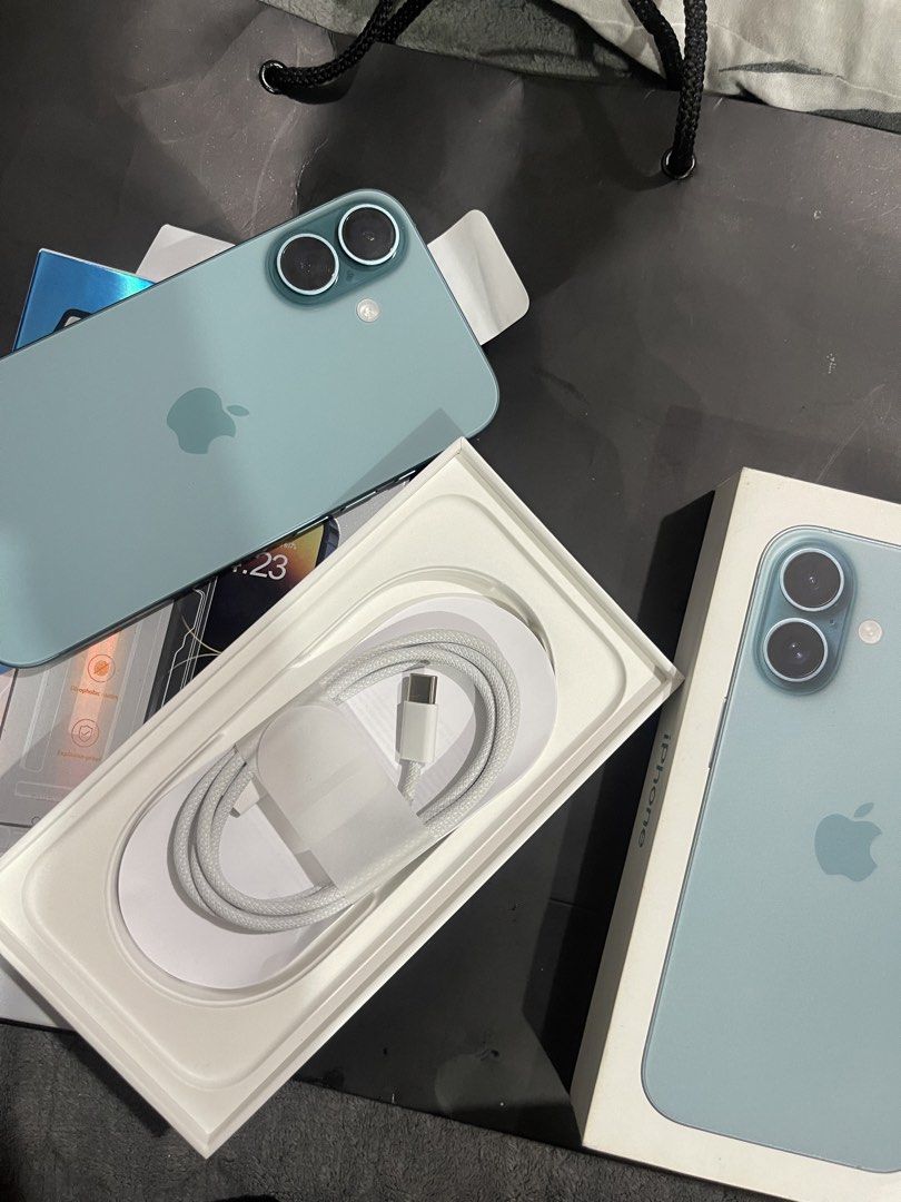 Iphone 16 128gb (Category: iPhone 16 Series) located in Manila. Submitted by 1levii (Listing ID 1458379275, Image 1). Description: Orig charger included Orig box with paper bag beyond the box na purchased 📍 Pasig .