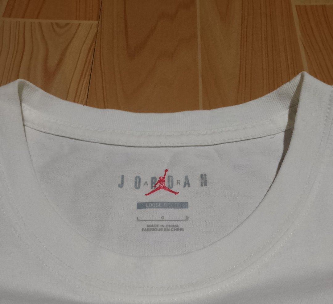 Jordan essential boxy tee2 (Category: Shirts) located in San Jose del Monte. Submitted by azetor (Listing ID 1458316462, Image 3). Description: - White Jordan T-Shirt - essential boxy tee2 - Fit: Loose fit crop top - Material: 100% Cotton - Features: Jumpman logo and 'Flight' graphic patch on chest - Ideal for: Casual wear - measurements - chest 20 - length 20 - excellent condition .