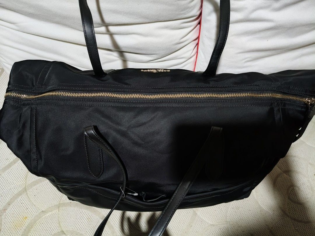 Kate Spade Weekender Bag (Category: Luxury Bags & Wallets) located in Quezon City. Submitted by online_sari_sari (Listing ID 1458436076, Image 3). Description: 💯 authentic nylon material only used once slightly negotiable PM for more pics.