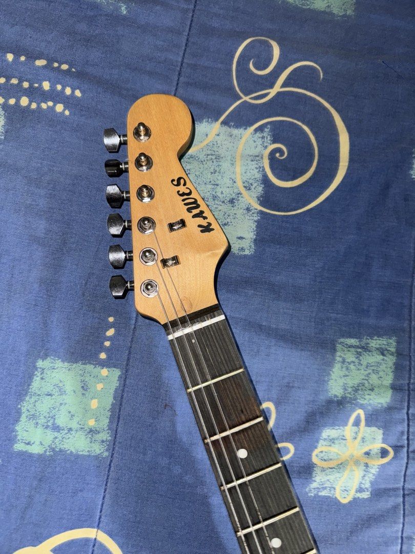 Kawes Electric Guitar with Amplifier (Category: Musical Instruments) located in Manila. Submitted by superkeiotic (Listing ID 1458333513, Image 3). Description: 🎸 FOR SALE: Kawes Electric Guitar + Amplifier — ₱3,500 Reason for selling: Used for only about a week, then eventually stored away since my cousin realized guitar wasn’t really his hobby 😅 Condition / Issue: • Has been stored for quite some time • Strings need to be replaced due to bein