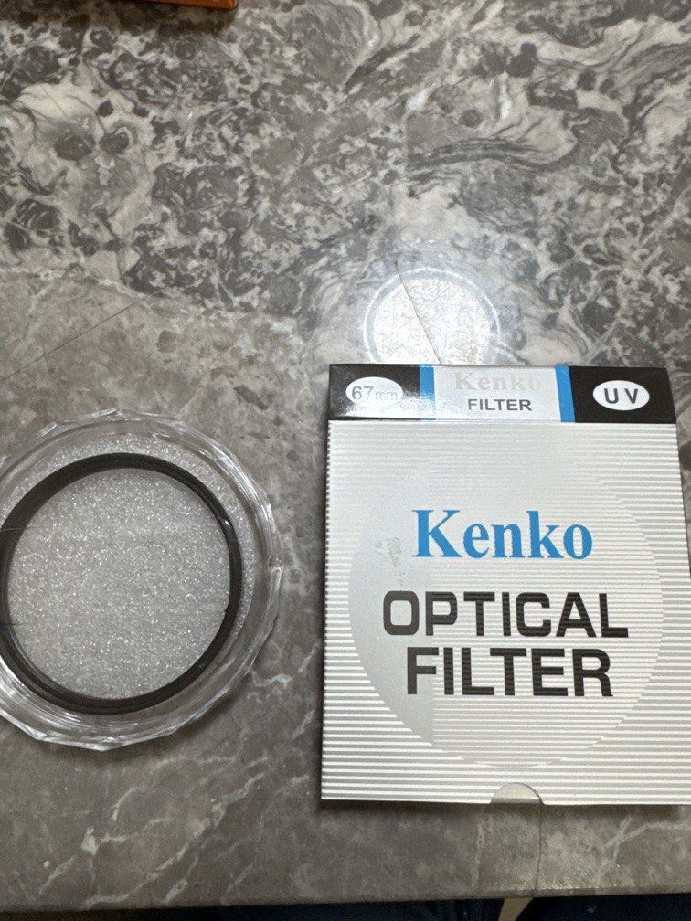 Kenko UV Filter (67mm) (Category: Other Photography Accessories) located in Manila. Submitted by m_preloveditems (Listing ID 1458447282, Image 1). Description: PLEASE CHECK THE PHOTOS FIRST *Dust and maybe scratches on one area but clean on the others RFS: Was supposed to use this as my UV Filter but I bought the K&F Nano-X instead Never used but opened box so negotiable .