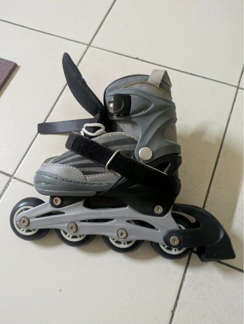 Kids Adjustable Inline Skates Rollerblades Size 11 (Category: Skates, Rollerblades & Scooters) located in Quezon City. Submitted by jessiemarketplace (Listing ID 1458323456, Image 1). Description: - Grey and black inline skates - Size 11-1 (fits 11 to 1) - Maximum weight limit: 60kgs - Synthetic upper and lining - PP sole - Ideal for beginners learning to skate - Adjustable straps for a secure fit.