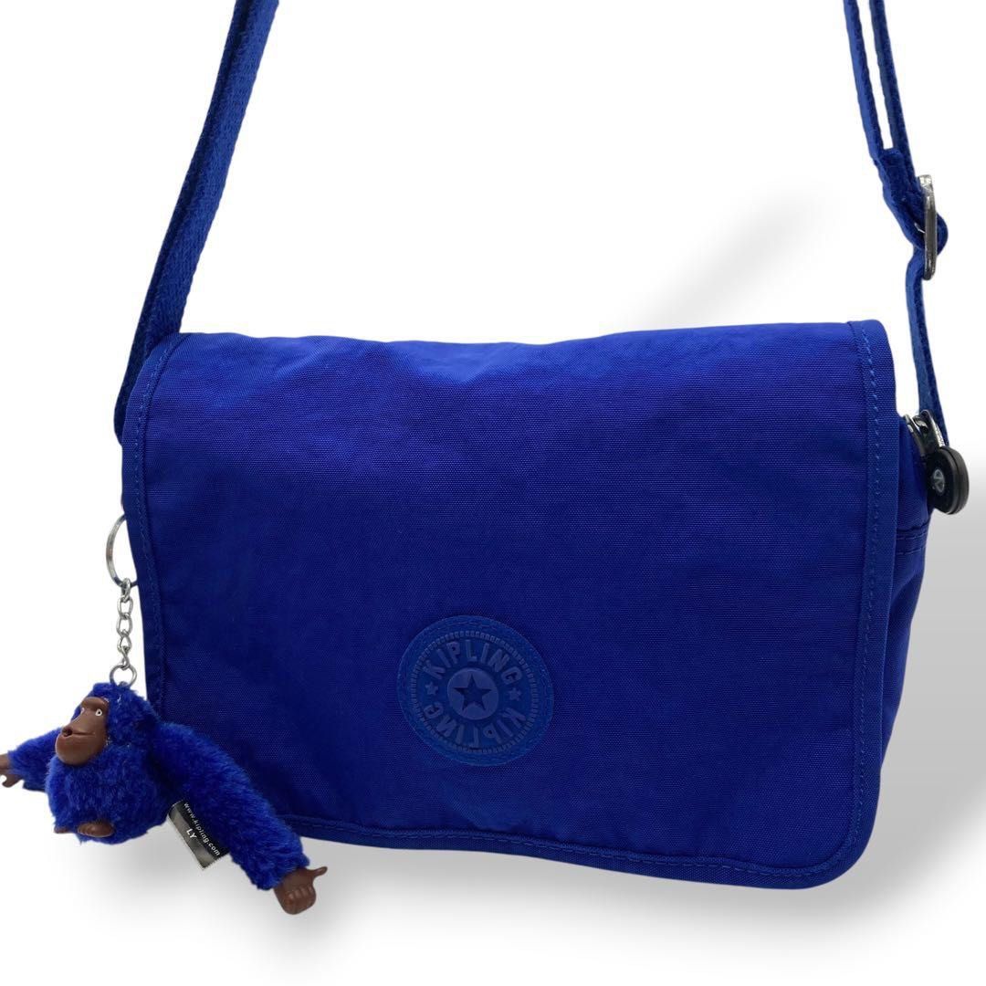 Kipling Delphin N Cross-Body Bag (Category: Cross-body Bags) located in Dasmarinas. Submitted by takarabox (Listing ID 1458471504, Image 3). Description: The Kipling Delphin N Cross-Body Bag is a highly organized, lightweight everyday bag praised for its practical hands-free design. This compact bag features a signature fold-over flap with a secure snap closure, hiding an efficiently compartmentalized interior crafted from water-repellent crinkle