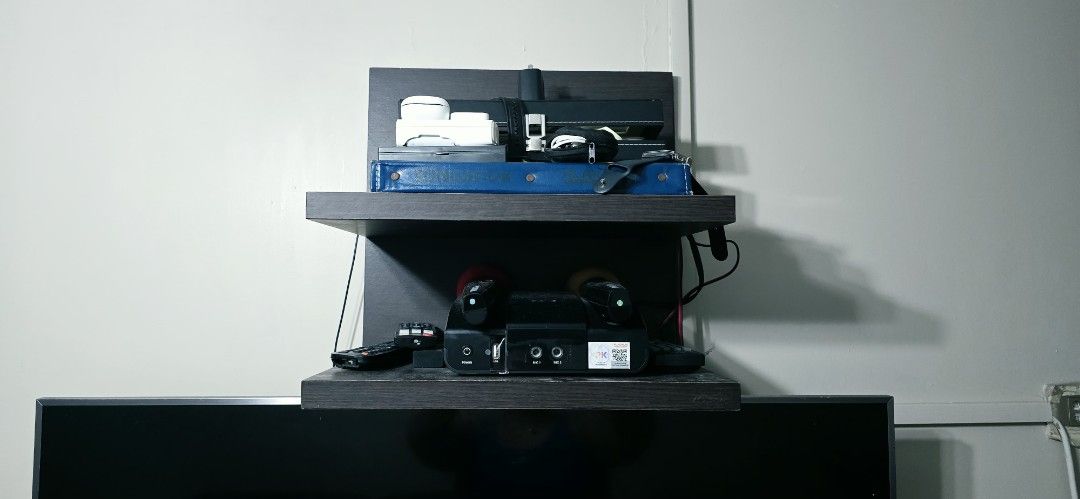 Koncept brand two-tiered floating wall shelf unit (Category: Shelves, Cabinets & Racks) located in Manila. Submitted by ubasirene (Listing ID 1458417077, Image 3). Description: - Koncept Brand Dual-tier shelf. Sturdy at heavy duty may kabigatan siya. - Ideal for tidying up your entertainment area or decors/ornaments. - Bought at Abenson Home 6K thus selling low for only 1K LP na po halos pamigay ko na 😀. - Approx 1.25 inches ka kapal ng shelves 