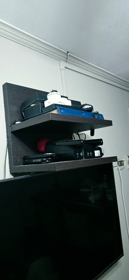 Koncept brand two-tiered floating wall shelf unit (Category: Shelves, Cabinets & Racks) located in Manila. Submitted by ubasirene (Listing ID 1458417077, Image 1). Description: - Koncept Brand Dual-tier shelf. Sturdy at heavy duty may kabigatan siya. - Ideal for tidying up your entertainment area or decors/ornaments. - Bought at Abenson Home 6K thus selling low for only 1K LP na po halos pamigay ko na 😀. - Approx 1.25 inches ka kapal ng shelves 